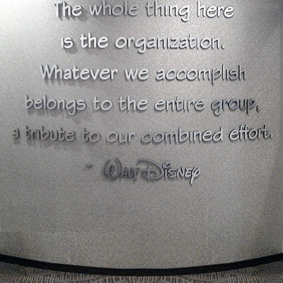 Disney brushed silver lettering on lobby wall Orange County - Caliber Signs & Imaging in Irvine Call: 949-748-1070