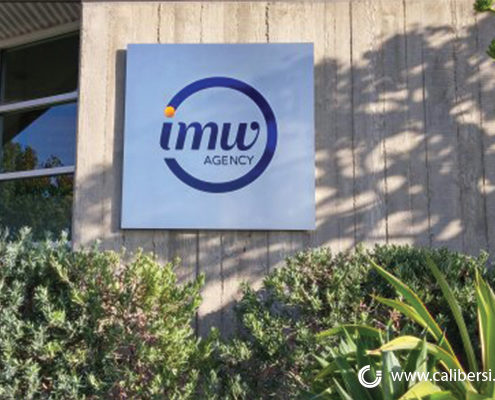 IMW Agency exterior building aluminum sign Orange County - Caliber Signs & Imaging in Irvine Call: 949-748-1070