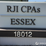 RJI and ESSEX monument sign - Orange County by Caliber Signs & Imaging in Irvine - 949-748-1070